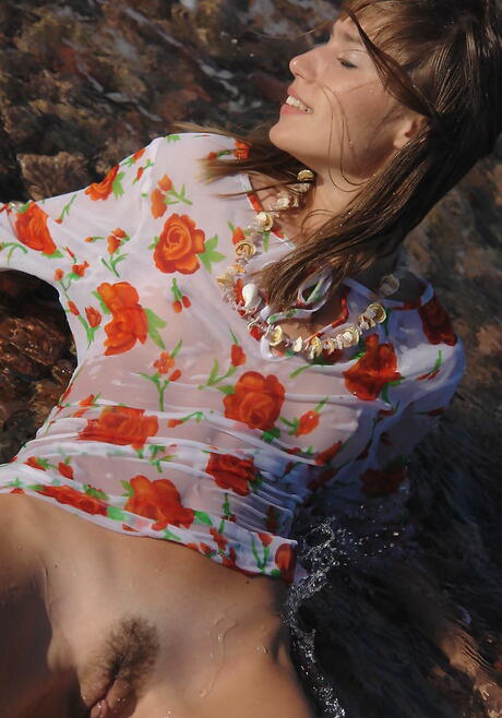 Excellent cutie Alizeya A uncovers tiny tits and hairy pussy at beach